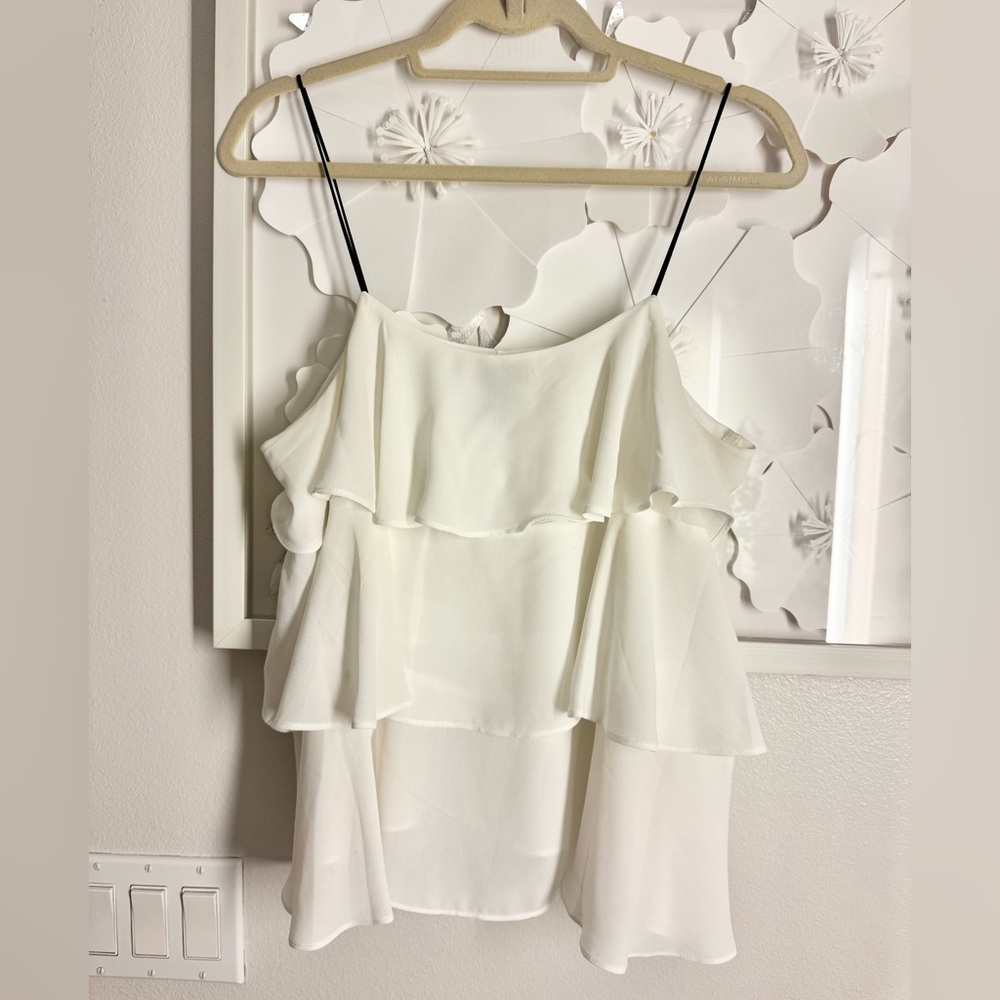 Aqua ruffle top in white. Size M